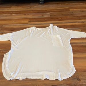 White cherish too with front pocket.  Size Large